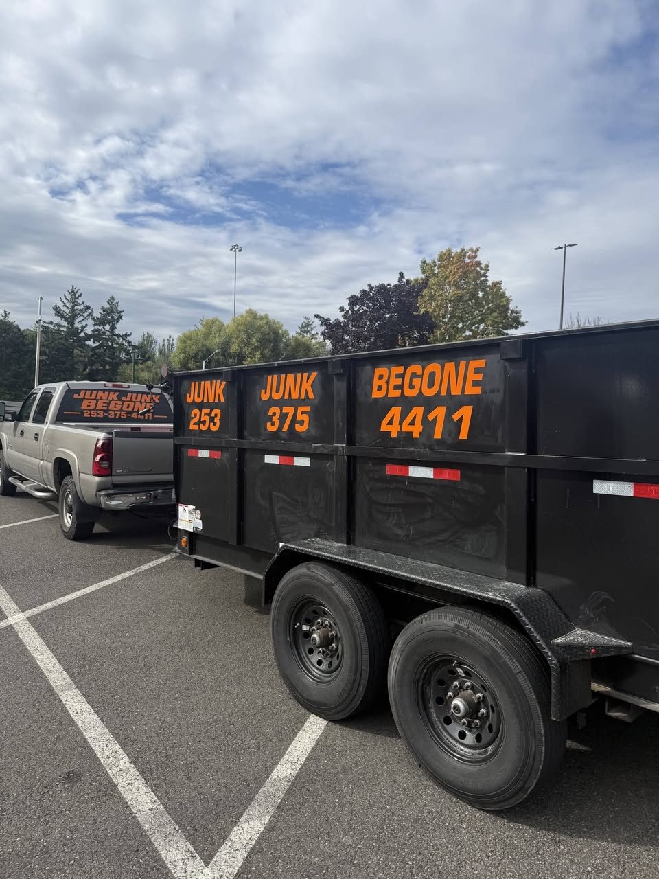 Junk removal truck and dump trailer